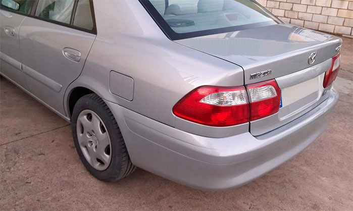 vehículo arreglado en taller